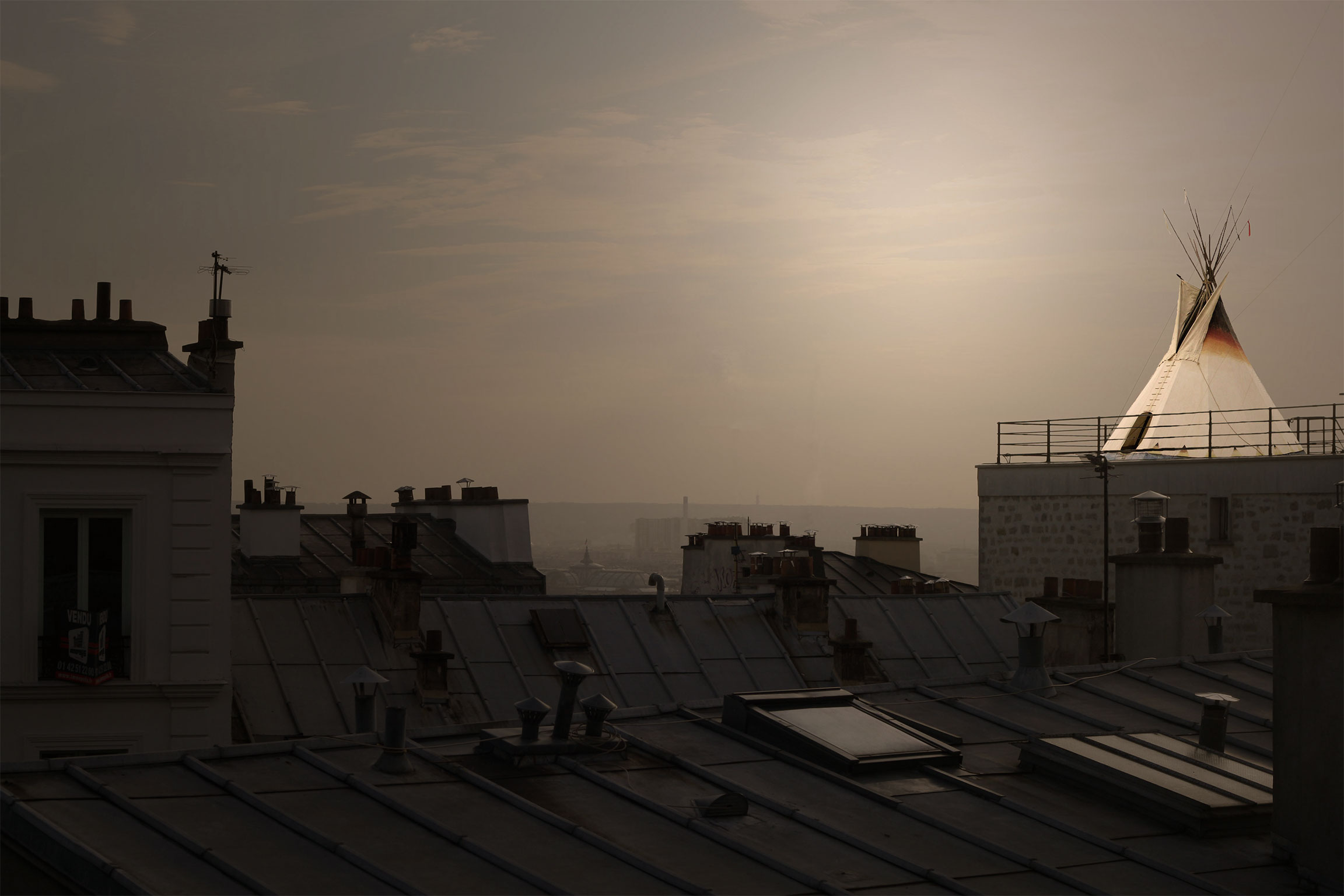 tipi on the rooftops of a big city