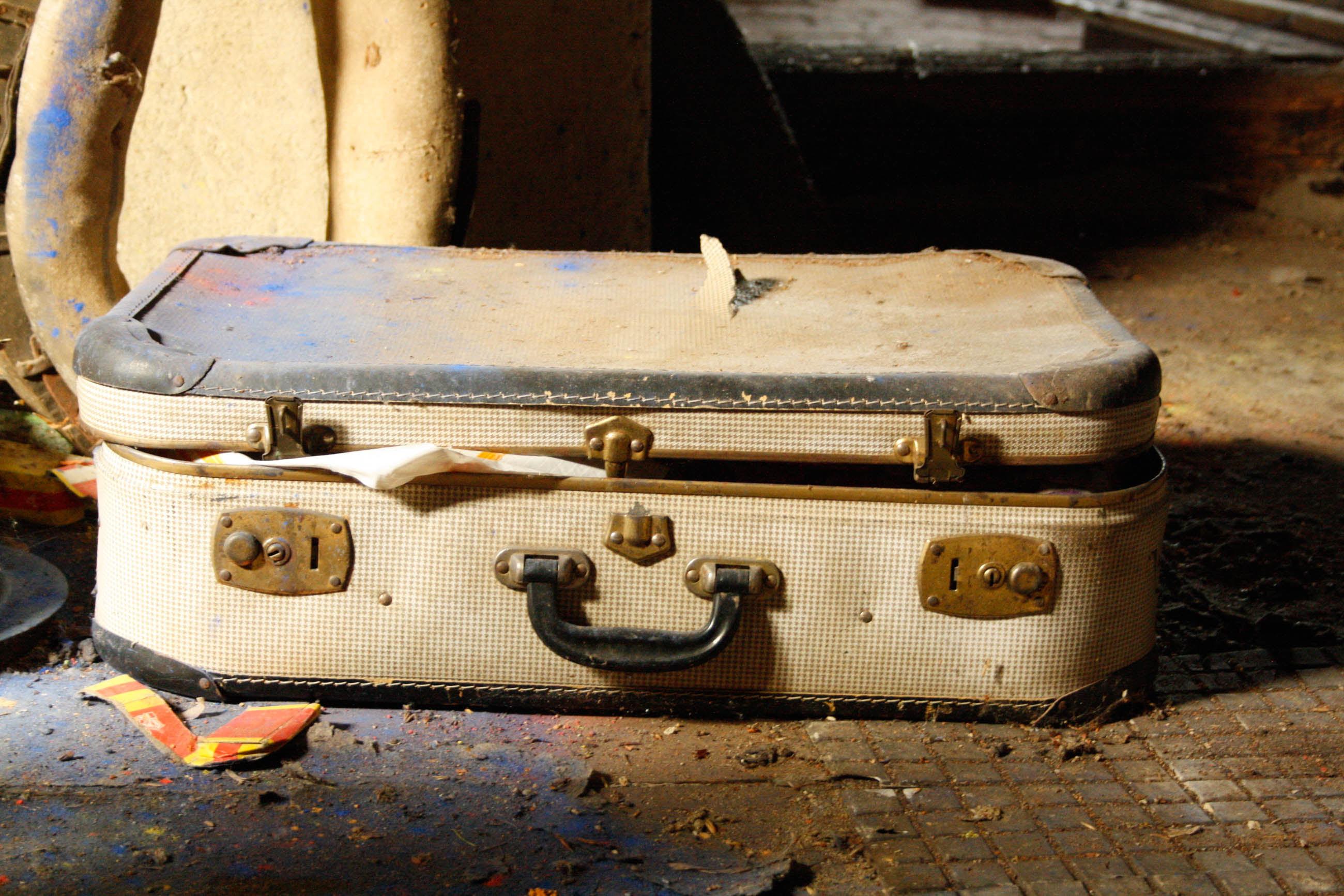 photo of old suitcase on attic